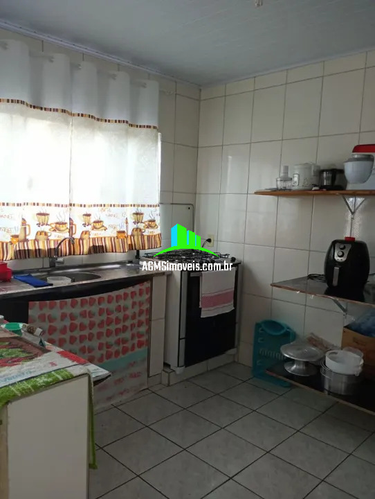 Casa à venda com 4 quartos, 125m² - Foto 1